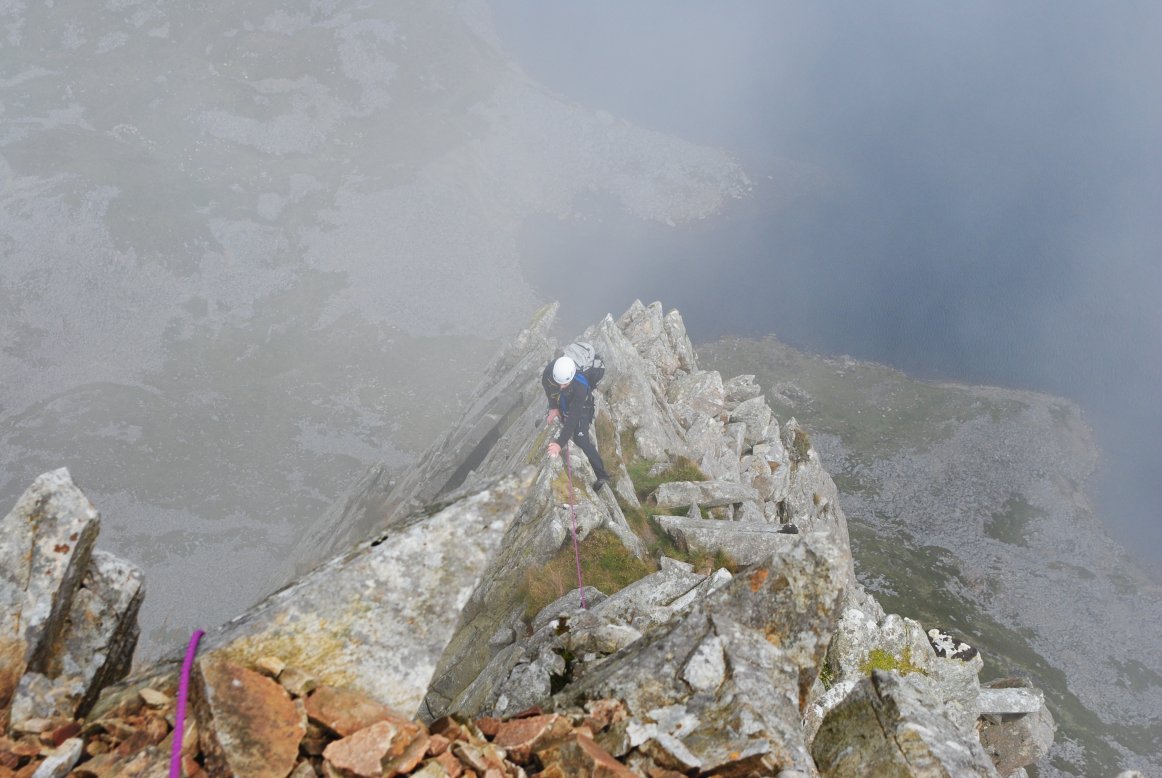 Client enjoying personal tuition in rock climbing