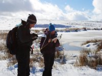 Clients on a winter navigation course in mid Wales